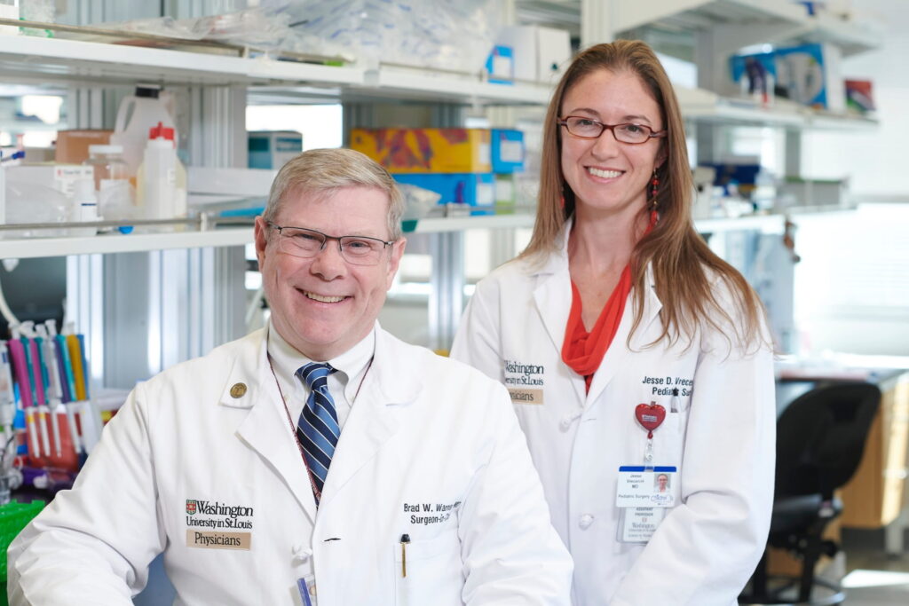 Doctors Brad Warner and Jesse Vrecenak in research laboratory