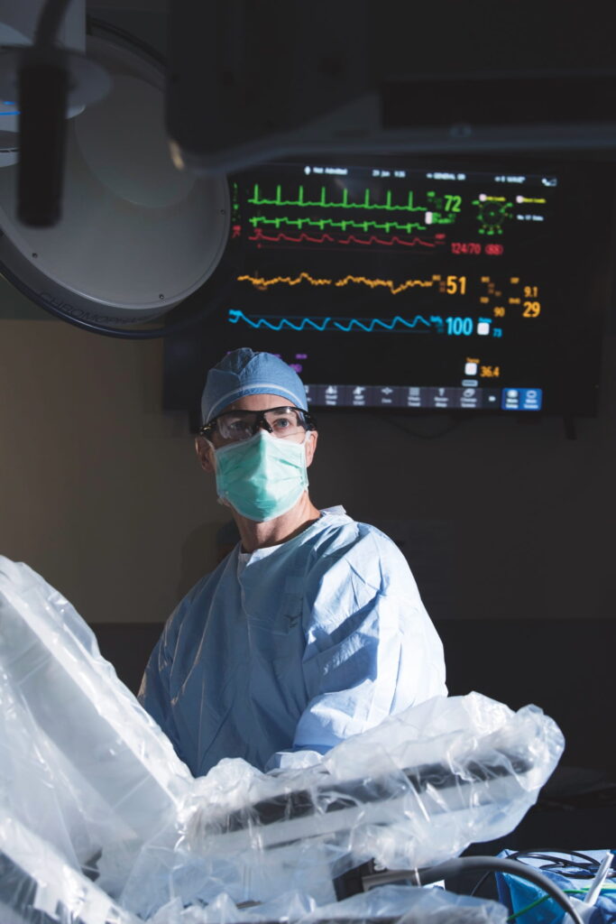 Doctor Hammill performing surgery in operating room