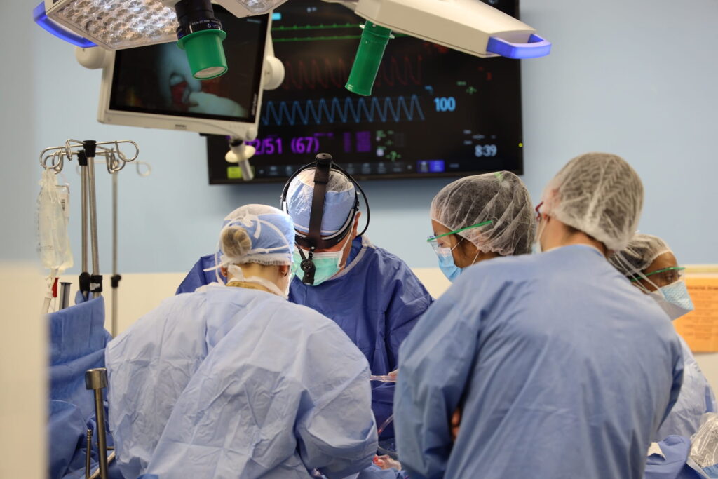 Doctor Glasgow performing surgery in operating room