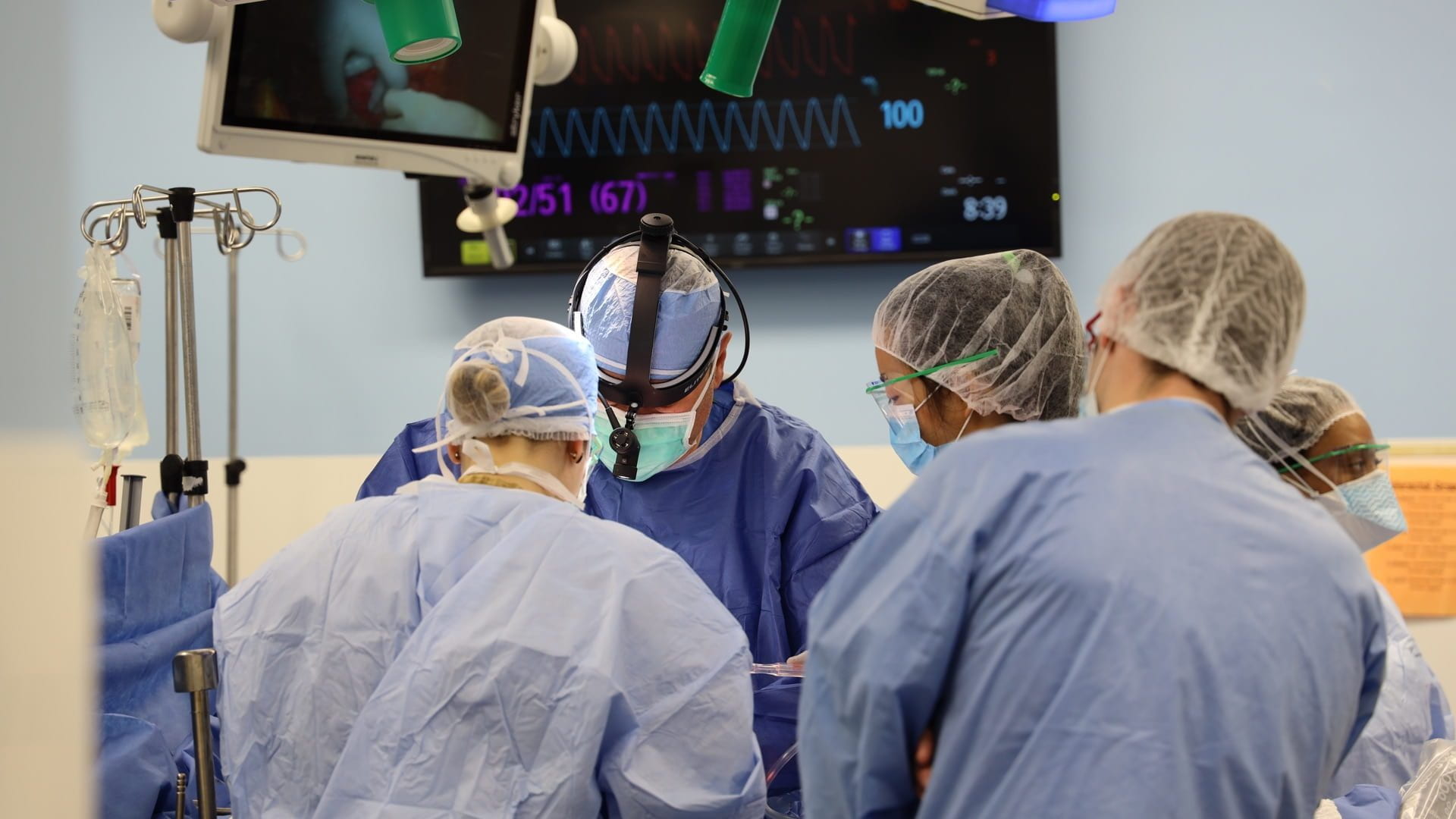 Doctor Glasgow performing surgery in operating room