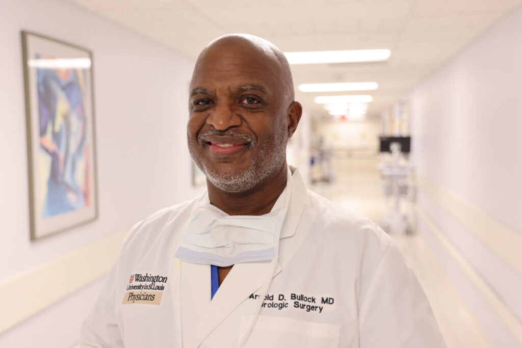 Arnold Bullock, MD, in the halls of Christian Hospital.