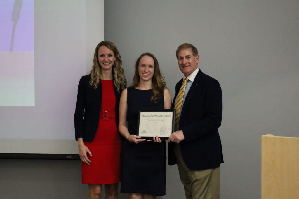 Researcher Amelia Van Handel receives award from surgeons Alison Snyder-Warwick and Steven Buchman