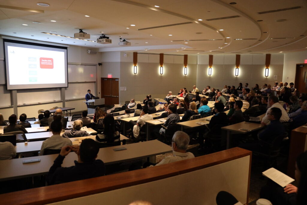 Lecture hall with audience and professor at Washington University