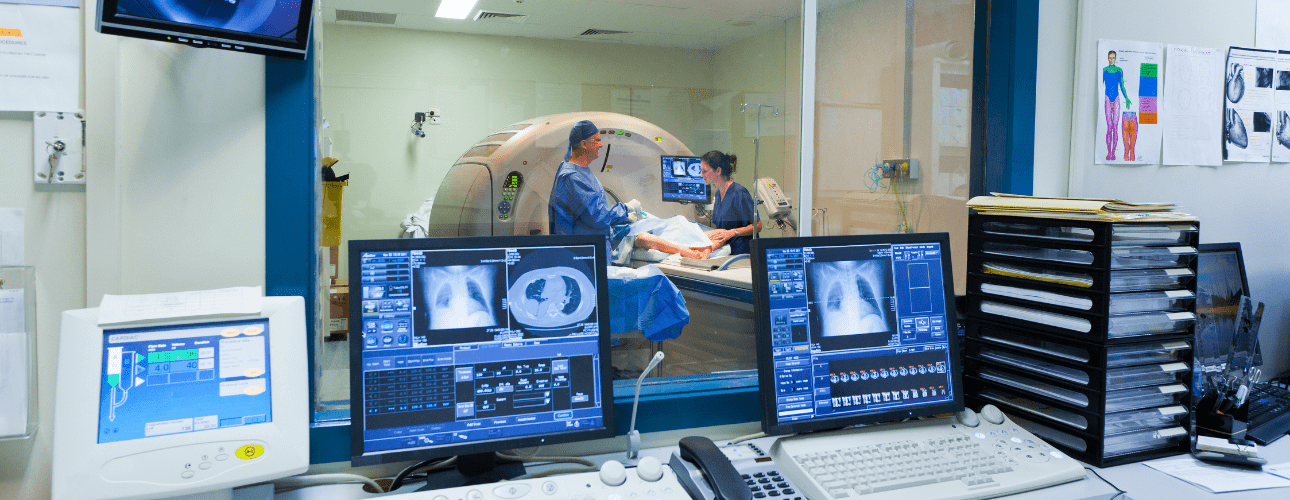 Image: Screening room while a patient enters a CT scan. 