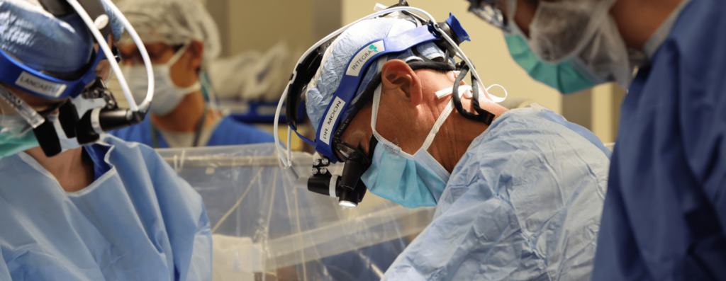 Marc Moon, MD, Section Chief of Cardiac Surgery at Washington University School of Medicine and President of the American Association for Thoracic Surgery, operating in the OR alongside the CT surgery team. 