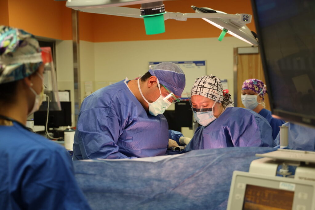 Pediatric surgeon Baddr Shakhsheer and team in operating room