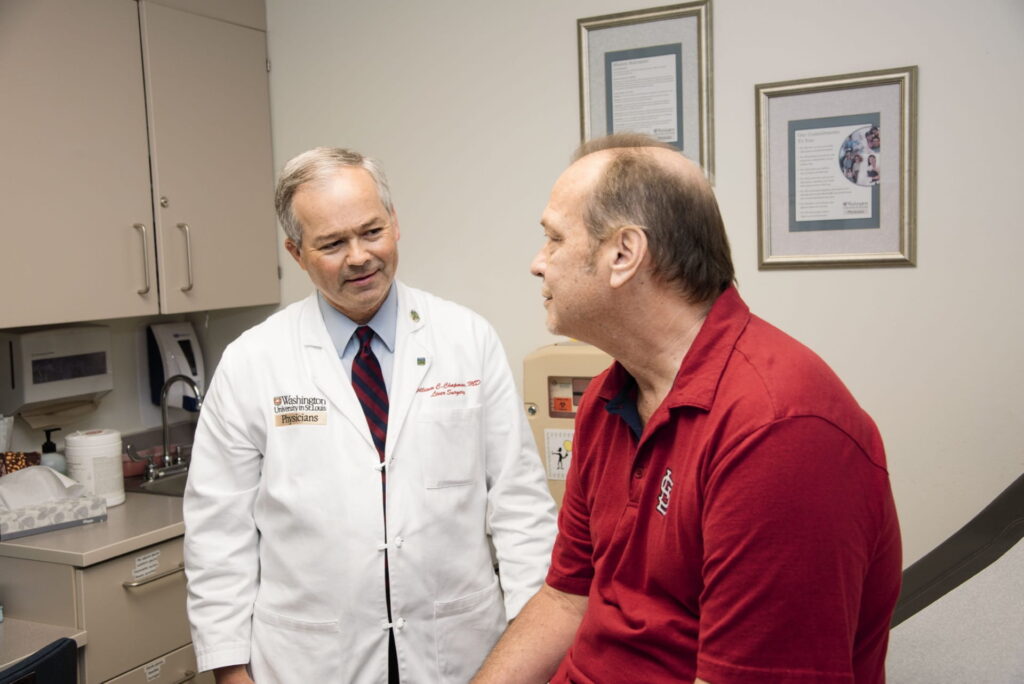 Dr. Chapman with patient in clinic