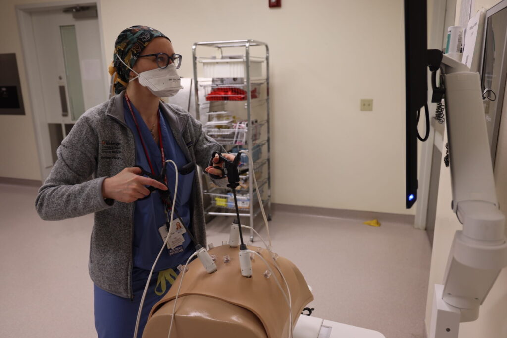 General surgery resident Eileen Smith, MD, using virtual reality simulator in WISE Center.