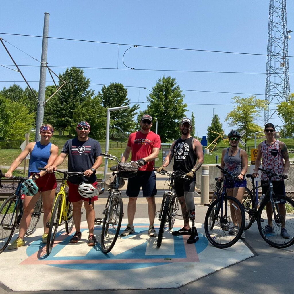Sam Schaefer and a group of bicyclists