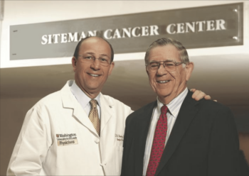 Dr. Timothy Eberlein, director of the Siteman Cancer Center, and philanthropist Alvin Siteman in 2014.