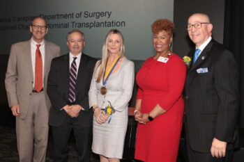 Majella Doyle, MD, with David H. Perlmutter, MD, dean of the School of Medicine, William C. Chapman, MD, director of the Division of General Surgery, Angelleen Peters-Lewis, PhD, chief operating officer and chief nurse executive of Barnes-Jewish Hospital, and Timothy J. Eberlein, MD, head of the Department of Surgery and director of Siteman Cancer Center.