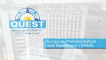 SPAR Program QUEST Award with backdrop of Barnes-Jewish Hospital